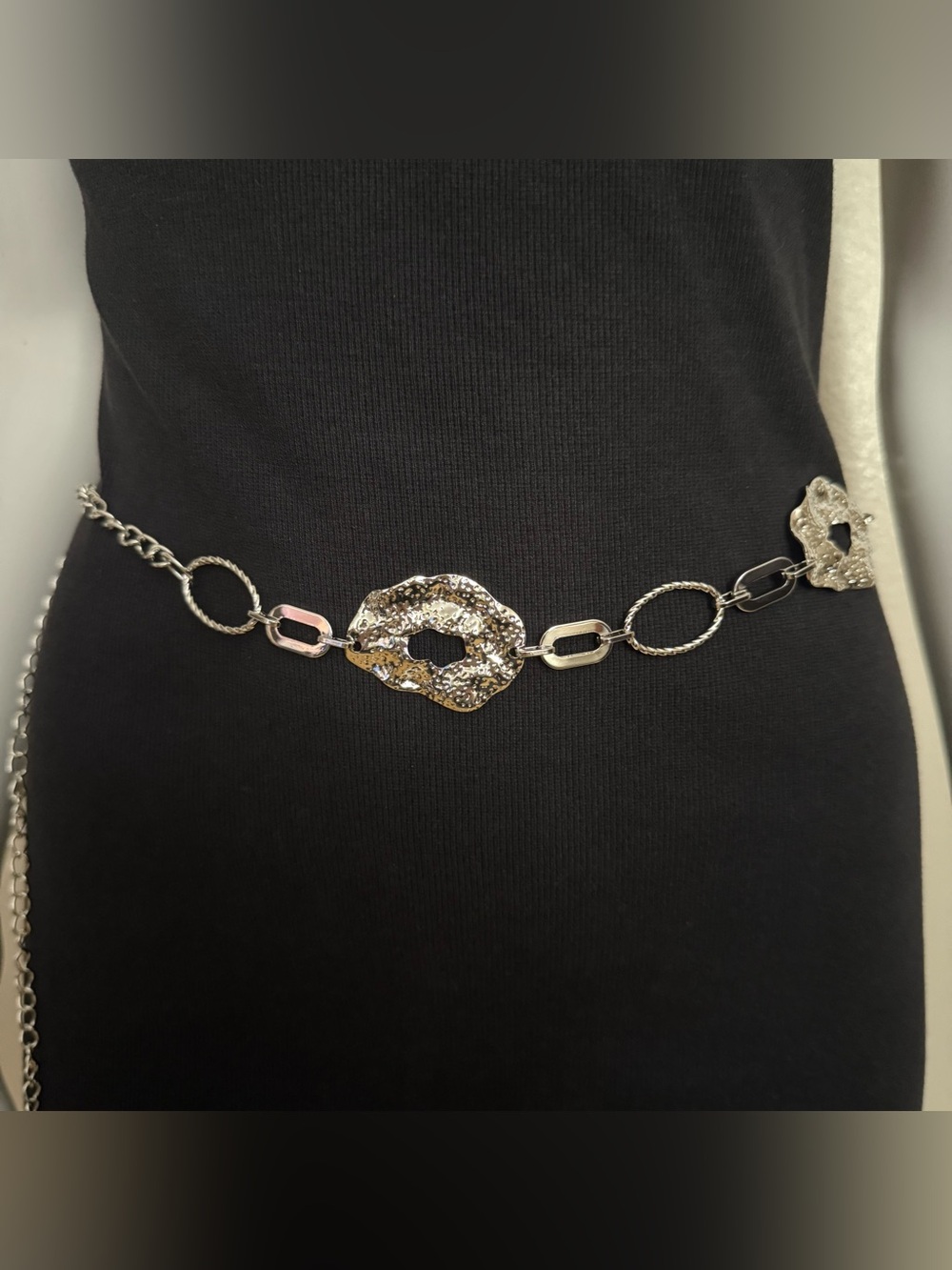 Silver tone metallic asymmetrical disc chain belt
